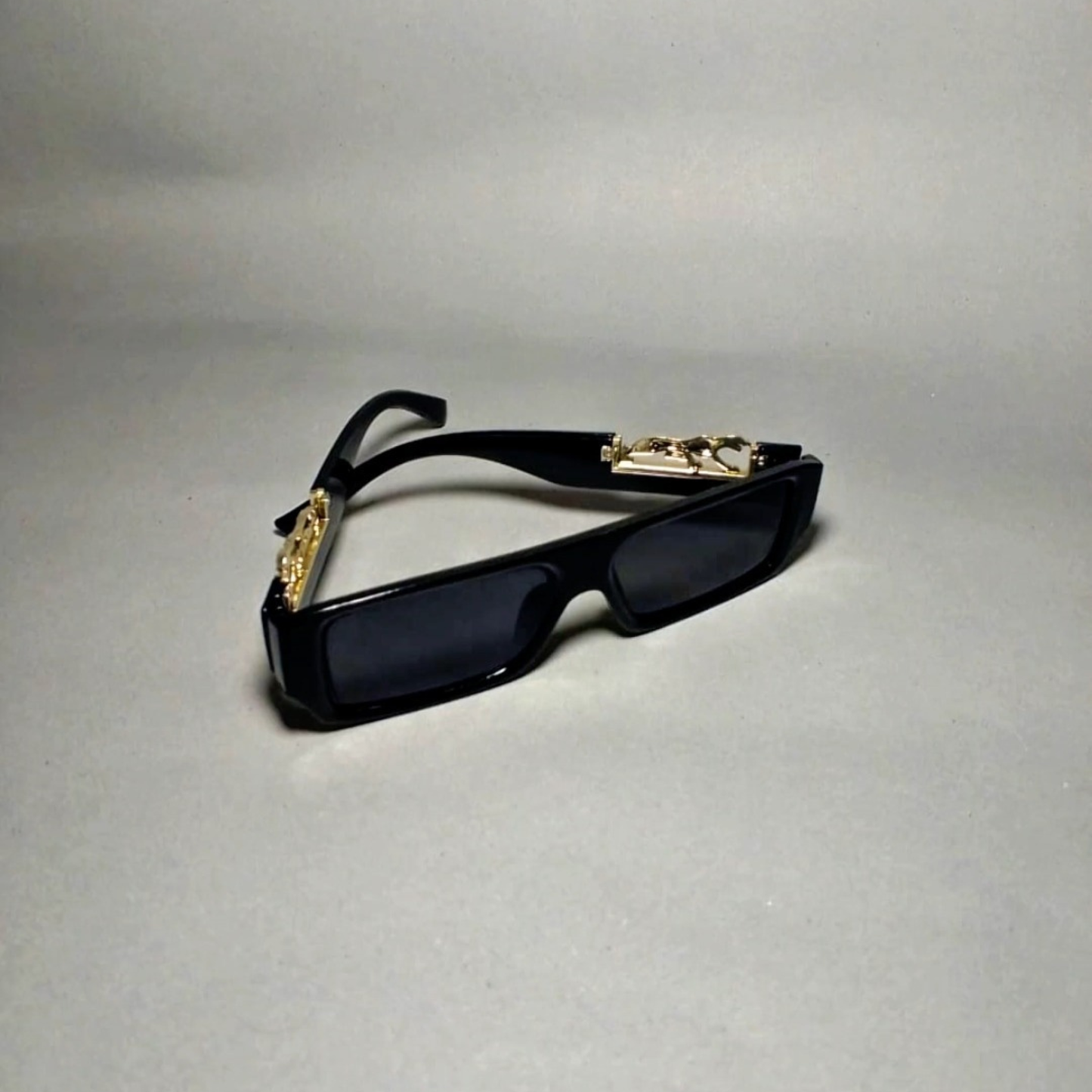 Classic Black Shades with Golden Touch – Stylish Unisex Sunglasses